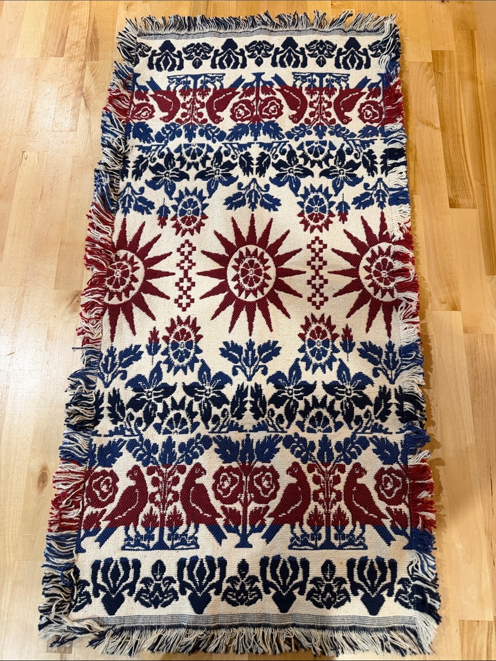 19th-century style red, white, and blue Jacquard-woven coverlet